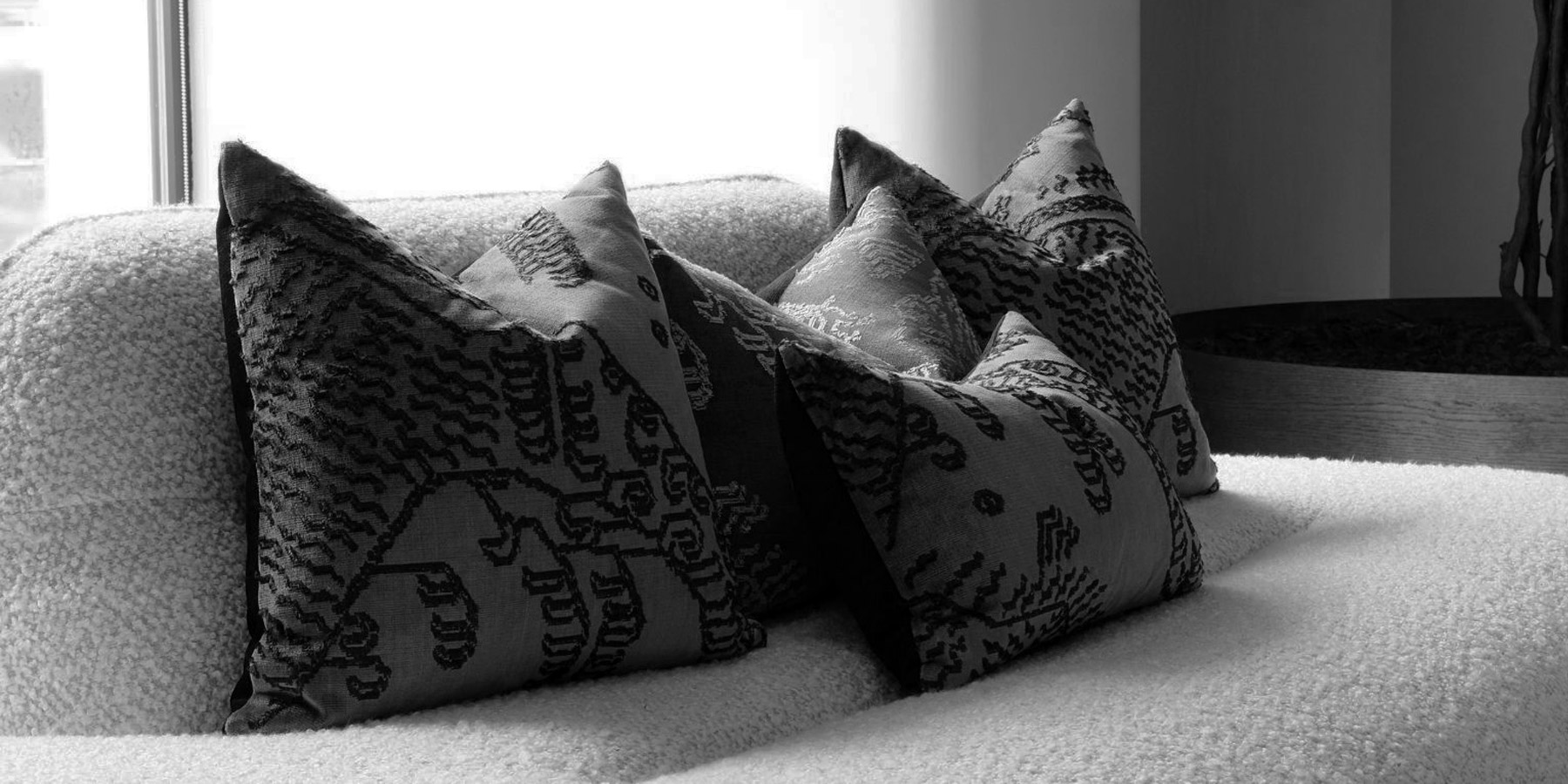 Remon Home Dedar Tiger Mountain decorative cushion sets styled on a boucle sofa